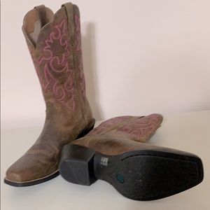 cowboy boots , pink stitching